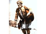 A water-seller at one of the limestone fountains, or natural wells, of Palestine. An early photograph.